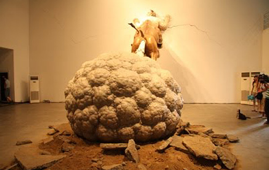 Golden Bull Fart Sculpture